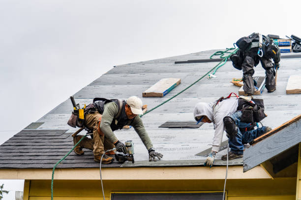 Professional Gutter Installation technician working in Perris, CA